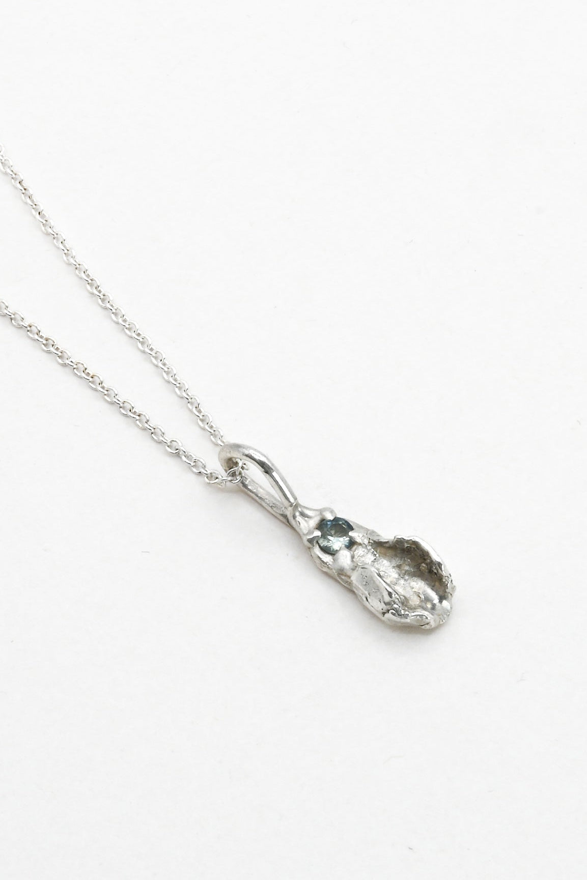 "Freyja" Necklace: Small Silver Vulva Pendant with Light Blue Sapphire