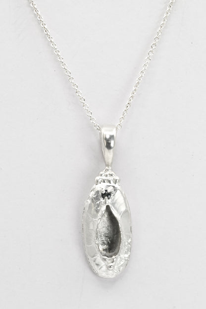 "Marina" Necklace: Large Silver Vulva Pendant with Dark Blue Sapphire