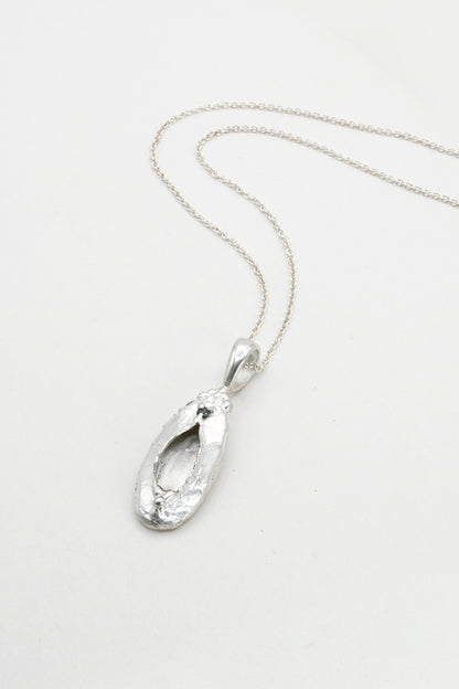 "Marina" Necklace: Large Silver Vulva Pendant with Dark Blue Sapphire