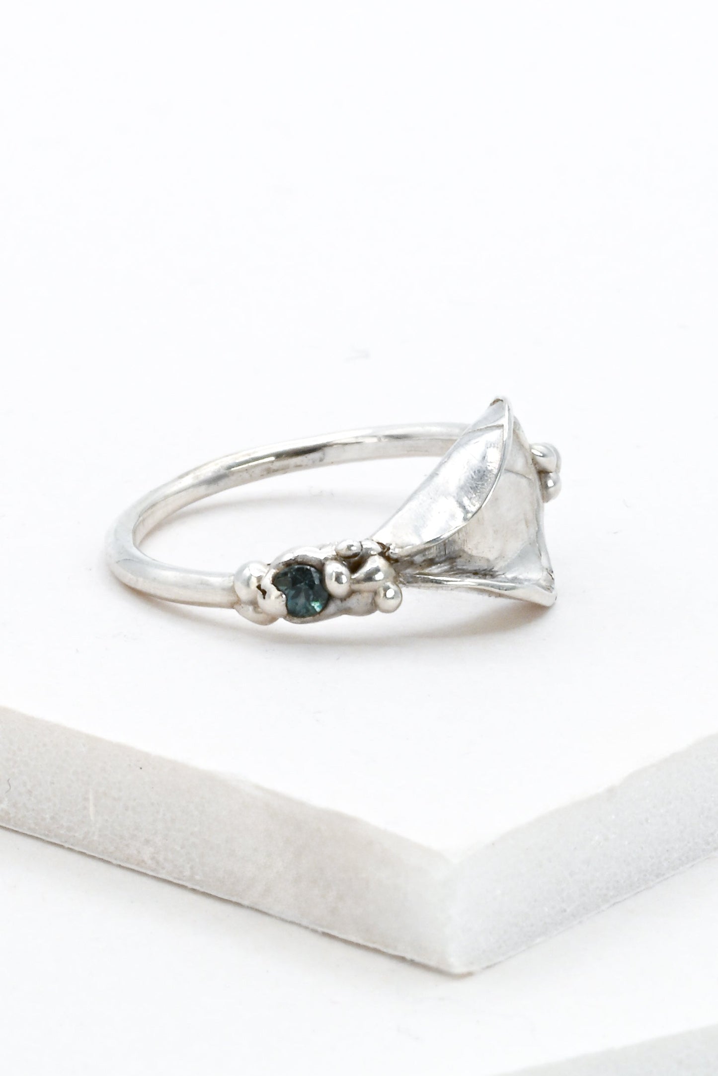 "Gaia" Impurity Ring: Sterling Silver Vulva Ring with Teal Blue Sapphire