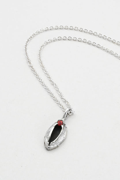 "Artemis" Necklace: Small Silver Vulva Pendant with Red Sapphire