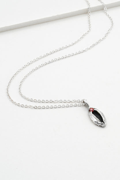 "Artemis" Necklace: Small Silver Vulva Pendant with Red Sapphire