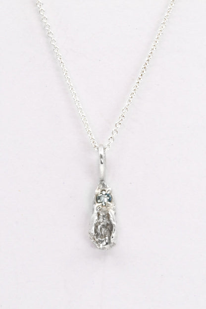 "Freyja" Necklace: Small Silver Vulva Pendant with Light Blue Sapphire
