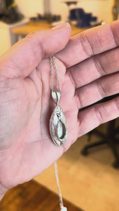 "Marina" Necklace: Large Silver Vulva Pendant with Dark Blue Sapphire
